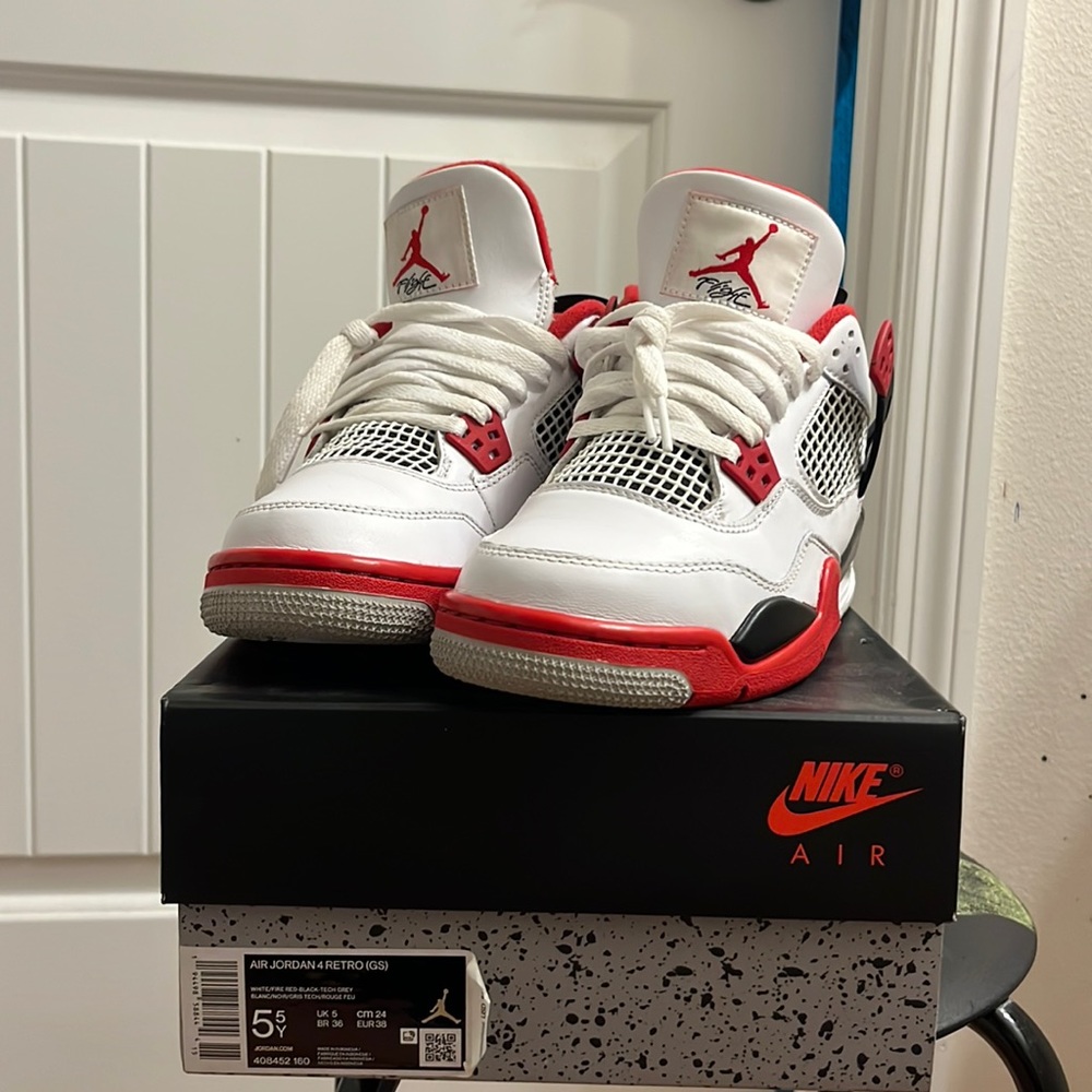 Air Jordan 4 Retro OG GS’ Fire Red 2020. Worn only a handful of times.